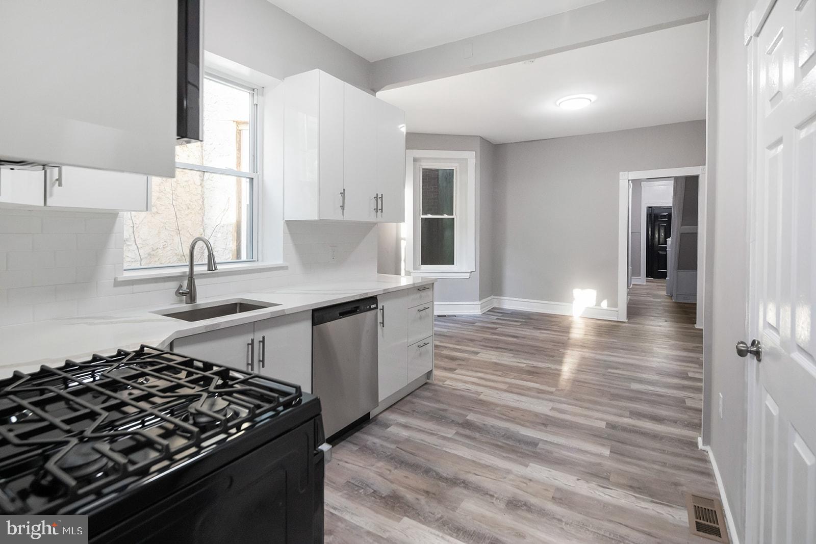 1 month free with a 13-month lease. (Advertised rate reflects net effective after special is applied, base rent is $1500/mo)
Live at 2332 N 25th St, a beautifully updated 4-bedroom, 1-bathroom home available now in North Philadelphia. This spacious property features a high-end finish, tall ceilings, and a bright, open layout.
The kitchen is equipped with brand-new stainless steel appliances, custom cabinetry, and stone countertops. Enjoy central heating and cooling and hardwood flooring throughout.
Schedule your tour today — this one won’t last!