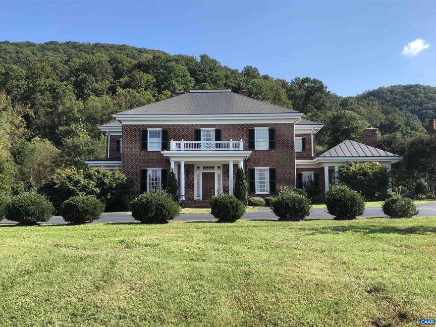 A rare, first-time offering. An exquisite, custom brick residence designed/built by the renowned team of Jay Dalgliesh, AIA, and Jeff Smith of Altera Construction. Only 6 miles west of town with incredible Blue Ridge views. Ample windows, transoms and french doors stream natural light into the well proportioned interior.  Rooms flow together with an easy elegance, each showing off the high level of detail and materials for which the architect and builder are known: custom cabinetry and millwork throughout, "12 over 12" windows, hardwood floors and 10+ foot ceilings.  Large climate-controlled wine cellar and recreational room in basement.  First and second floor master suites. An impressive 2+ car garage, blue stone patios, house generator and kitchen garden round out this exceptional offering.  One of the highest quality homes currently on the market.,Granite Counter,Wood Cabinets,Fireplace in Family Room,Fireplace in Living Room,Fireplace in Master Bedroom