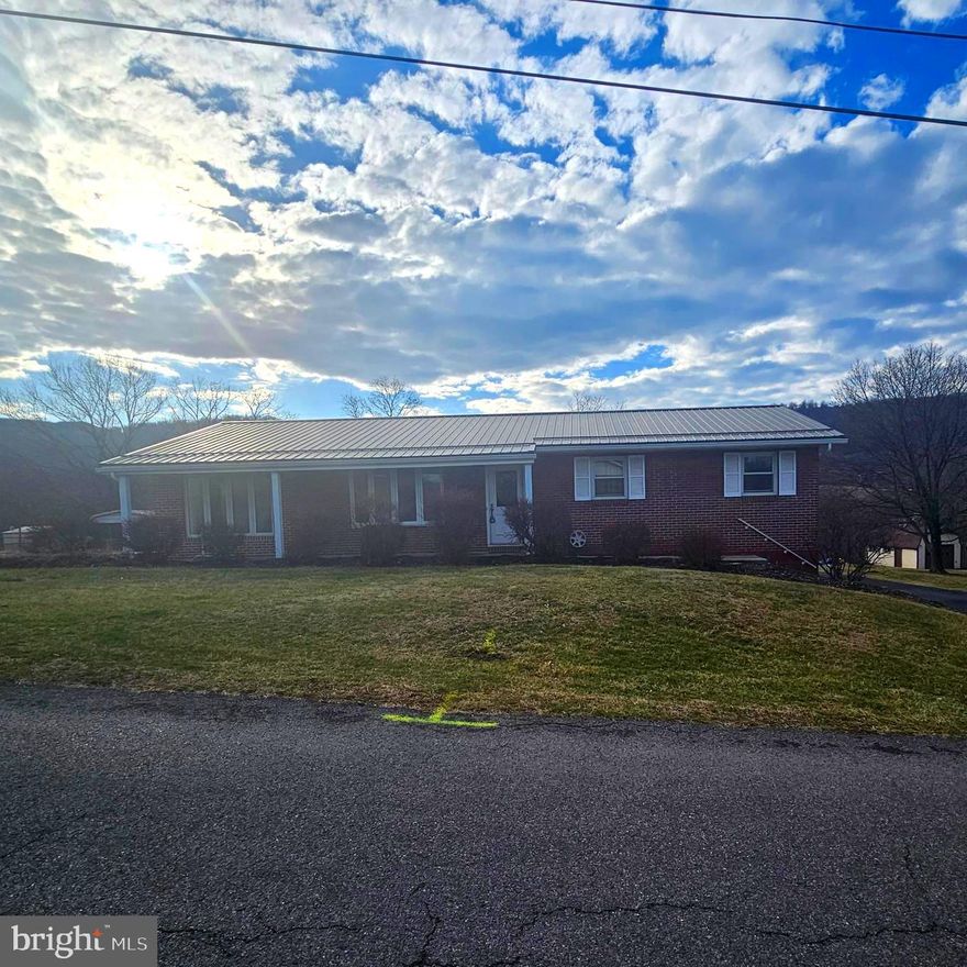 BACK ON THE MARKET- BUYER FINANCING FELL THROUGH. Nestled in the serene Valley View subdivision, this charming ranch-style home offers a perfect blend of comfort and functionality. Built in 1967, this well-maintained brick residence boasts 1,363 square feet of thoughtfully designed living space on the main floor, featuring four spacious bedrooms and two full bathrooms, ideal for both relaxation and entertaining. Step inside to discover a sunroom with 3 walls of windows allowing tons of natural light to flow through. Next venture down to a fully finished basement that expands your living area, providing endless possibilities with a family room with bar area, a bedroom, a small office area, laundry area, and full bath. The inviting layout flows seamlessly, creating a warm atmosphere that feels just like home.  Park your car in the detached garage that provides convenient parking and additional storage.  Use the attached breezeway (enclosed porch area) to get into the house. The additional sheds add even more utility to this delightful property.  The rear backyard is fenced in and the lot goes beyond the fenced area. The expansive lot consists of 2 parcels (includes tax id 04 7C003500000000) for a total of 0.92-acre that offers ample outdoor space for gardening, play, or simply enjoying the tranquility of nature where you will even find a brick fireplace BBQ. With its classic architectural style and solid construction, this home is not just a place to live, but a canvas for your personal touch. Imagine cozy evenings spent in your backyard, or hosting gatherings in your spacious living areas. Located in a peaceful neighborhood, this residence is close to local amenities, ensuring that everything you need is just a short drive away. Experience the perfect blend of comfort, space, and community in this inviting home. Don’t miss the opportunity to make it yours!
Note- Central air is in upstairs only.  Upstairs heats with natural, gas downstairs has electric baseboard heat.