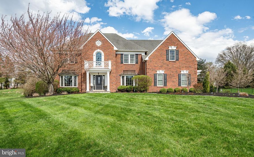 Prestigious Living in the Estates of Salford Lea

Tucked away at the end of a quiet cul-de-sac in the coveted Estates of Salford Lea, this stately brick-front Colonial offers over 5,000 sq ft of impeccably designed living space—perfect for those who appreciate space, privacy, and timeless charm.

Step into a grand two-story foyer, where natural light pours in and classic elegance sets the tone. Just off the entry, a sunlit home office offers a serene space for work or study.

At the heart of the home, the expansive eat-in kitchen is a chef’s delight, featuring dual wall ovens, abundant cabinetry, and generous room to gather. The adjoining family room is warm and inviting, with a wall of windows, a cozy gas fireplace, and a convenient second staircase.

Upstairs, the luxurious primary suite is your private sanctuary, complete with a sitting area, dual walk-in closets, and a spa-like en suite bath boasting a heated towel rack, walk-in shower, and separate vanity area. Three additional bedrooms and two full baths provide comfort and space for everyone.

The finished basement is a showstopper, offering a private bedroom and full bath—ideal for guests or extended family. Enjoy the versatility of an expansive rec area with a wet bar, built-in dishwasher, and fridge, plus a dream workshop with its own exterior access.

Step outside to a large fenced yard with a sprawling patio—perfect for outdoor entertaining or simply relaxing in your own peaceful retreat.

This remarkable home truly has it all: generous living space, thoughtful details, and a prime location in one of the area’s most desirable neighborhoods.