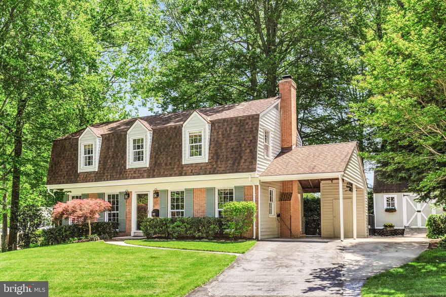 Open House Saturday May 17th (1-3pm) and Sunday May 18th (1-3pm) - Welcome to this sensational dutch colonial home in sought after Manor Woods! Sitting quietly on a pristine corner lot in the heart of the community, this property features a popular floor plan and includes many impressive updates! A traditional main level holds a large living room, separate dining room, powder room, and an updated gourmet kitchen that opens to relaxing family room with fireplace! A spacious upper level holds a beautiful primary suite complete with a large walk in closet and a luxurious en-suite bathroom! Down the hall you will find three sizable bedrooms rooms and updated hall bathroom! A finished lower level with walk out to the backyard, features an amazing at home theater complete with projector and screen! Also find a laundry room, space for at home gym, and additional storage space! A lovely, fully fenced, backyard holds a massive shed and a private patio for summertime meals! Also enjoy carport parking plus added driveway space for additional vehicles! This exceptional community location is just steps from Manor Woods Pool, Elementary and Middle Schools, and is just minutes from Rock Creek Park trails, area shopping,  and Red Line Metro! Come quickly!
