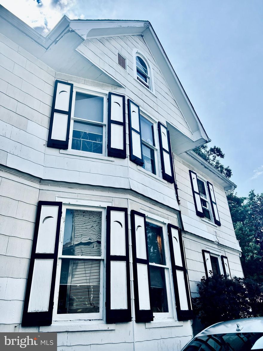 Get yourself and your loved ones the perfect holiday gift! Historic Charm Meets Modern Comfort: Your Baltimore Oasis Awaits at 523 Rossiter Avenue! This is an opportunity to own a piece of history, not another boring flip. Step into the timeless elegance of this captivating Baltimore home, circa 1923, where character and charm are preserved in every detail, seamlessly blended with the comforts of modern upgrades. Nestled in the quiet and highly desirable neighborhood of Radnor Winston, this unique property offers an exceptional lifestyle opportunity! Personalize three to four versatile bedrooms, one full bathroom, and a convenient Baltimore flush in the basement. The possibilities are truly endless with additional rooms perfect for a rec room or even a massive walk-in closet—use your imagination! Gleaming wood floors flow throughout the home, and the kitchen boasts striking tin ceilings and exposed brick, showcasing the preserved historic integrity. The former owner recently replaced major systems for peace of mind: the architectural shingle roof is roughly 4 years old, as is the boiler. Never worry about parking with a covered carport, driveway, and detached garage with an office offering multiple spaces. Discover your personal outdoor oasis with tranquil gardens that offer peace and relaxation. The fully fenced backyard is truly idyllic, providing a private retreat perfect for unwinding or cultivation. A lovely backyard patio and deck create the perfect setting for entertaining friends and family on a warm evening. Enjoy easy access to multiple public transit options in the area. The home is conveniently located near major medical centers, including the renowned GBMC HealthCare and University of Maryland St. Joseph Medical Center in nearby Towson, as well as the Downtown campuses of Johns Hopkins. Education hubs are also easily accessible, with proximity to institutions like Loyola University Maryland, Johns Hopkins University Homewood Campus, and Notre Dame of Maryland University. You are minutes away from the vibrant Belvedere Square Market, a local hotspot featuring some of Baltimore's best small businesses, diverse restaurants, and unique retail shopping. For a premier experience, the expansive four-level Towson Town Center, offering a broad selection of fashion and luxury brands, is just a short drive away. Baltimore's rich cultural tapestry, including museums, theaters, and historic sites in areas like Downtown Baltimore, Station North, and the Inner Harbor, are within easy reach for weekend outings. Book your private tour today!  **Seller would like all prospective purchasers to know that Google photos are old and do not represent the home's current condition. Professional marketing will be shot on or before 11/26/2025.**