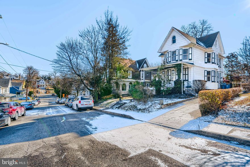 Historic Charm Meets Modern Comfort: Your Baltimore Oasis Awaits at 523 Rossiter Avenue! This is an opportunity to own a piece of history, not another boring flip. Step into the timeless elegance of this captivating Baltimore home, circa 1923, where character and charm are preserved in every detail, seamlessly blended with the comforts of modern upgrades. Nestled in the quiet and highly desirable neighborhood of Radnor Winston, this unique property offers an exceptional lifestyle opportunity! Personalize three to four versatile bedrooms, one full bathroom, and a convenient Baltimore flush in the basement. The possibilities are truly endless with additional rooms perfect for a rec room or even a massive walk-in closet—use your imagination! Gleaming wood floors flow throughout the home, and the kitchen boasts striking tin ceilings and exposed brick, showcasing the preserved historic integrity. The former owner recently replaced major systems for peace of mind: the architectural shingle roof is roughly 4 years old, as is the boiler. Never worry about parking with a covered carport, driveway, and detached garage with an office offering multiple spaces. Discover your personal outdoor oasis with tranquil gardens that offer peace and relaxation. The fully fenced backyard is truly idyllic, providing a private retreat perfect for unwinding or cultivation. A lovely backyard patio and deck create the perfect setting for entertaining friends and family on a warm evening. Enjoy easy access to multiple public transit options in the area. The home is conveniently located near major medical centers, including the renowned GBMC HealthCare and University of Maryland St. Joseph Medical Center in nearby Towson, as well as the Downtown campuses of Johns Hopkins. Education hubs are also easily accessible, with proximity to institutions like Loyola University Maryland, Johns Hopkins University Homewood Campus, and Notre Dame of Maryland University. You are minutes away from the vibrant Belvedere Square Market, a local hotspot featuring some of Baltimore's best small businesses, diverse restaurants, and unique retail shopping. For a premier experience, the expansive four-level Towson Town Center, offering a broad selection of fashion and luxury brands, is just a short drive away. Baltimore's rich cultural tapestry, including museums, theaters, and historic sites in areas like Downtown Baltimore, Station North, and the Inner Harbor, are within easy reach for weekend outings. Book your private tour today!