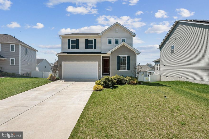 This beautiful 4-bedroom, 3.5-bath offers 3,967 finished square feet of living space, including a fully finished walkout basement with an in-law suite. Built in 2021, the home features an open-concept main level with hardwood floors and a gourmet kitchen with island seating.  The backyard has a vinyl fence for the pets and a composite deck perfect for enjoying sunsets. Upstairs includes 3 spacious bedrooms, a rec room, and laundry for added convenience. The basement boasts a 4th bedroom, full bath, kitchenette, and extra living space, ideal for guests, rental income, or multigenerational living. Easy access to shopping and commuting routes!