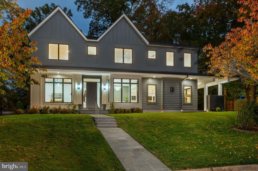 Main features

Located in the highly sought-after Kenwood Park neighborhood, this brand-new residence by Red & Friends, design and interiors by Duren Projects, sits on an expansive quarter-acre corner lot and offers over 6,100 sq ft of living space. The home features five bedrooms (with an optional sixth), five full bathrooms, two half bathrooms, and an elevator-ready shaft. Ideally situated, it is just 5 minutes to downtown Bethesda, near to Westbard Square’s new shops and restaurants, the Metro, major commuter routes, and offers direct access to Washington, D.C.

Design & Finishes
A true custom build, this home showcases high-end design details throughout. The interior seamlessly blends colors and textures, enhanced by sophisticated lighting fixtures in all main rooms. 7.5” wide solid white oak flooring, complements contemporary custom steel railings with matching white oak handrails, while extra-large Andersen 400S windows bathe the home in natural light, creating an elegant architectural flow.

Main Level
Soaring 10’ ceilings create an open and inviting atmosphere. The layout features a welcoming foyer, an elegant formal dining room, a sun-filled seating area/studio, and a spacious family room with gas fireplace. The gourmet kitchen is designed for both function and style, offering two distinct islands: a cooking island with Thermador appliances and a bar island adjacent to the wet bar area, plus a separate dining room overlooking serene trees. Custom cabinetry, a walk-in pantry, quartz countertops and backsplash, and 16-foot sliding glass doors to the covered porch complete the space. A designer powder room, mudroom with expanded storage space, and 2-car garage finish this level.

Second Level
The luxurious primary suite boasts dual walk-in closets and a spa-inspired bathroom clad in warm wood-toned porcelain, featuring a soaking tub, double-shower-head walk-in shower, and dual vanities with LED mirrors. Three additional bedrooms include en-suite baths, complemented by an open loft and a convenient laundry room.

Lower Level
The expansive recreation room with wet bar and wine cellar/storage anchors this level. A flexible bonus room (perfect as a gym or additional bedroom), guest suite with en-suite bath, powder room, and a charming kids’ playhouse under the stairs complete this versatile space.

Outdoor Living
Professionally landscaped grounds offer a flagstone covered porch with brick-clad gas fireplace, plus a separate terrace off the kitchen ideal for grilling.