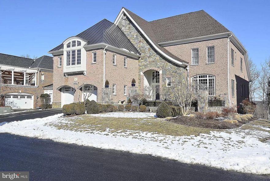 Step into a realm of classic elegance and timeless design, where neutral color palettes defy passing trends seen on the latest HGTV series. This exquisite property, nestled within the coveted River Creek Country Club in Leesburg, Loudoun County VA, boasts the McArthur model by Mitchell and Best Custom Builders. Situated on one of just 31 lots offering Potomac River water views and scenic fairways of the River Creek Golf course, this home epitomizes exclusivity in a secure community. Only 31 single-family Potomac Water view homes exist, with just one hitting the market and swiftly finding a new owner in the past year.

Set in a secure gated community and on a private cul-de-sac, this residence stands out as one of the few single-family water-view homes featuring a main floor owner's suite. Over the last 8 years, meticulous maintenance and close to $400k in remodeling upgrades, including a new roof, HVAC, and kitchen, have elevated this home to surpass the standards of new construction.

Perfect for both work-from-home functionality and entertaining, the outdoor space steals the show with breathtaking views from all three levels. The manicured rear garden, complemented by a new maintenance-free composite deck, becomes the favored hangout and dining spot—a tranquil haven where you can savor your morning coffee or evening wine.

Step into the front garden, adorned with a Versailles vignette, a fountain, and ample seating—an inviting space to engage with neighbors on leisurely strolls.

Indoors, the home seamlessly combines open and spacious rooms with cozy corners, showcasing high ceilings, balconies, and hardwoods throughout. The main level office/library with custom built-ins provides an ideal workspace, while the owner's suite, boasting a new fireplace, double walk-ins, and water views, exudes sheer opulence.

Venture to the lower level with walkouts onto a new patio, transforming into your personal event space with a private bar, fireplace, and gaming areas. Abundant storage spaces and a versatile finished flex space over the garage further enhance the home's appeal.

Discover the rich history of the River Creek Community, an exclusive enclave just 20 minutes from IAD and close to the DC metro in Ashburn. Premium shopping, cultural attractions, and diverse dining options are within easy reach.

Embrace a lifestyle where world travels, cultural experiences, and serene countryside living converge in this unique and unmatched residence. Tee up on the Potomac at Leesburg's premier golf experience, featuring an 18-hole championship course designed by Ault-Clark. River Creek's comprehensive golf program, complete with an in-house Golf Academy and Fitting Area, nationally recognized professionals, and a vibrant calendar of tournaments and events, positions it as one of the most valuable golf memberships in Northern Virginia.

Belong to the River Creek Club—a home away from home that cultivates a relaxed, resort atmosphere, emphasizing outstanding service and amenities. This is not just a residence; it's a destination—a haven where luxury living seamlessly blends with the perfect blend of sophistication and leisure.