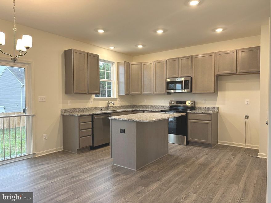 Brand New Gemcraft Homes Exclusive – The HANOVER in Beautiful Romney, WV! 
Welcome home to the stunning HANOVER by Gemcraft Homes — a thoughtfully designed single-family residence that perfectly blends modern comfort with scenic charm.
Perched gracefully atop the rolling hills of Romney, this brand-new home offers breathtaking views and peaceful surroundings in the highly desirable South Hills School District. Enjoy the privacy of your own paved driveway leading to a spacious 2-car garage, setting the tone for the quality and care found throughout.
Main Level Living at Its Finest!
Step inside to an inviting open-concept great room designed for today’s lifestyle. The seamless flow between the living area, kitchen, and pantry creates the perfect space for entertaining, gathering, and everyday living.
The main level also features three generously sized bedroos, a full hall bath conveniently located for guests and secondary bedrooms and a luxurious owner’s bedroom suite complete with a private en-suite bath and coveted walk-in closet.