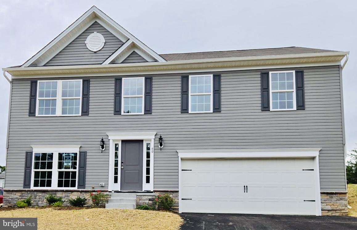 A Brand New Gemcraft Homes exclusive! The HANOVER home design is a single-family home with 3 bedrooms, 3 baths, and a 2 car garage. The home is perched beautifully on top of the hills of Romney with a nice view. Enter the property on your private paved driveway and into the spacious 2 car garage. Upon entering the main floor, there is an open concept great room with an open floor plan featuring the kitchen and pantry. Also on the main level are three bedrooms with a full bathroom conveniently located in the hallway for the adjacent to the two bedrooms and guests to utilize. The highlight of the main level bedrooms is the owner’s suite with an en-suite owner’s bathroom and the coveted walk-in closet. The lower level boasts the interior entrance from the garage, family room, den, full bath and a spacious laundry room. Located in the charming town of Romney in the popular South Hills SD, the home is convenient to schools, shopping and employment. Come to WV and enjoy this brand new home! Home is still having finishing work completed. More pictures coming soon!