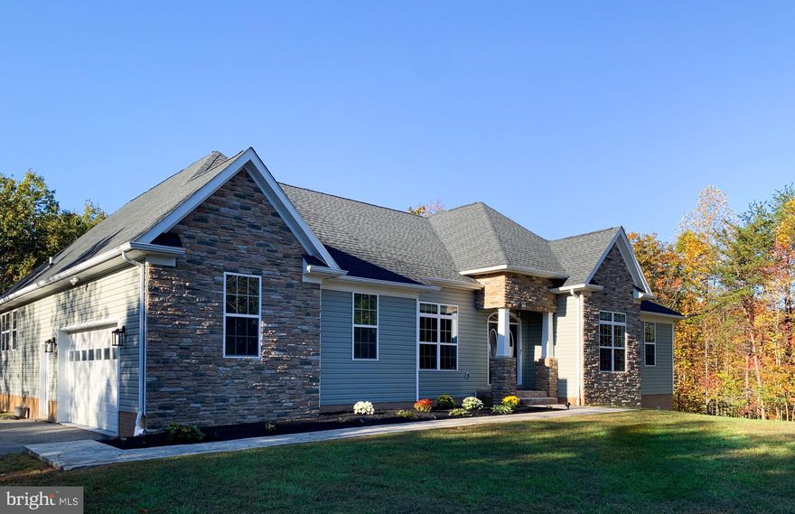 73 HOUR KICKOUT in place 
No HOA, 3+ Acres in Hughesville 
THIS HOME IS MOVE IN READY! Be home for the holidays in this spacious rambler with soaring ceilings and split bedroom design.  Fresh paint and new carpet throughout. Open concept with well equipped kitchen that features double wall oven, granite counter tops, double sink,42 inch cabinets, recessed lights and tile floor. Kitchen flows into large eat in area with a bright wall of windows that opens to a balcony where you can enjoy watching the sun set and listen to the sounds of nature. Family room with elongated octagonal tray ceiling and a gas fireplace to keep you cozy. Formal dining room with hardwood flooring, chair rail and crown moulding.  Three spacious bedrooms on one side of the home share a full bath while the owners suite features two walk in closets, en-suite with soaking tub, separate shower and double vanities and lots of storage. Large laundry room with tile floor and utility tub conveniently located close to garage and kitchen. Half bath also located right off kitchen and garage. Enormous unfinished basement has walkout slider and two windows that provides with many opportunities to expand your living space. Such a functional floor plan!
NO HOA fees, NO front foot benefit fee! Come visit this impressive rambler set on a 3 acre wooded lot located in a cul-de-sac. Minutes from park n ride for commuters to DC, 30 minutes to Pax River NAS.