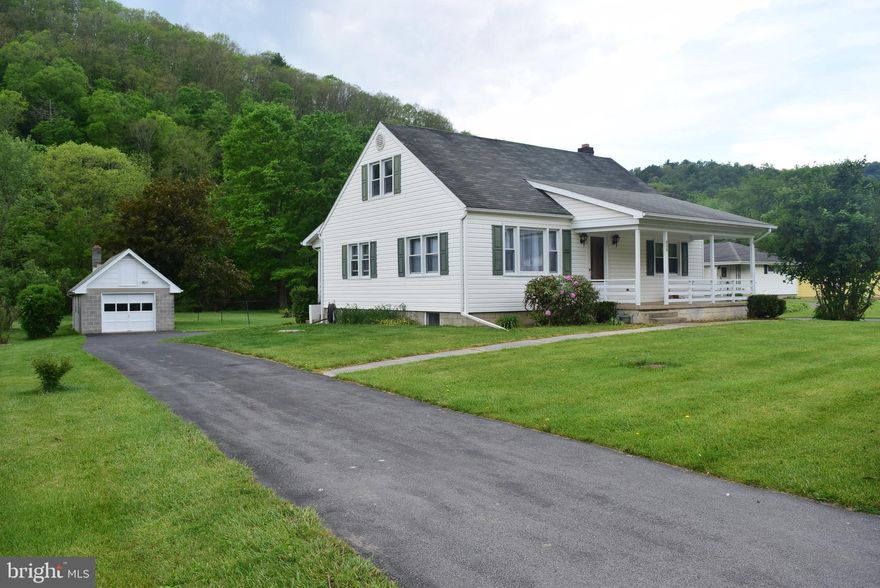 OPEN HOUSE - Sunday, May 31st, 2:00 - 3:30 PM. Charming BEASD Cape Cod tucked into a tranquil .7 acre setting with plenty of space, character, and functionality. This 4-bedroom, 1-bath home offers a flexible layout with a convenient main-floor bedroom and full bath and additional main level bedroom. Second floor includes two additional bedrooms and extra living space to fit your needs. The spacious eat-in kitchen provides room to gather, while a mix of hardwood flooring, durable LVP and carpet adds warmth and practicality throughout the home. Forced-air heat and central air conditioning add comfort and convenience.  
The walk-up lower level features laundry and an unfinished workshop area with endless potential for hobbies, or storage. Enjoy quiet mornings and relaxing evenings from the home’s two porches overlooking the peaceful surroundings. 

Outside, you’ll find a convenient, asphalt circular driveway, a detached 15x31 one-car garage with extra storage space above, along with an additional 10x12 shed for tools and equipment. Fish off your own land at the back of the lot where Wallace Run trout stream runs through.  

A wonderful opportunity to enjoy comfortable living with charm, storage, and workspace both inside and out.