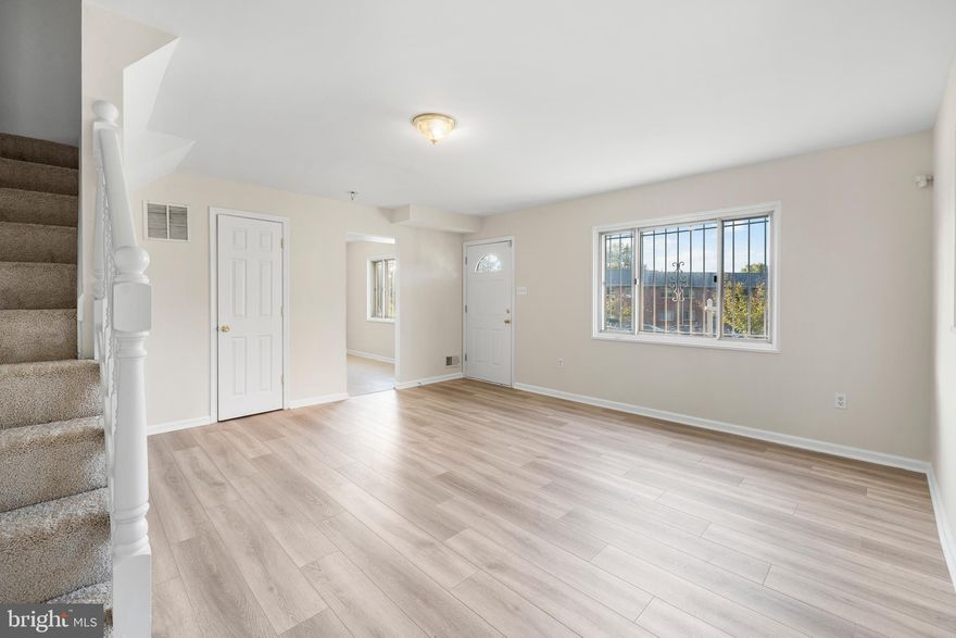 Back on the market! Featuring a brick front, two finished levels, a private driveway, four bedrooms, and 2.5 bathrooms, this tastefully remodeled semi-detached townhome welcomes you home. With a brand-new roof, new carpeting, and brand-new paint throughout, this home. You can locate the living room on the main level, which has LVP flooring, the dining room adjacent to the kitchen, which has ceramic tile flooring and a quartz countertop, the laundry room, and the door leading to the rear. Go up to the top floor to find four bedrooms and two complete bathrooms. Include the location's proximity to FedEx Field, the Wayne Curry Sports and Learning Complex, and the National Harbor. The area is also close to hotels, restaurants, and retail stores. DC, Alexandria, VA, and the National Harbor are all nearby.