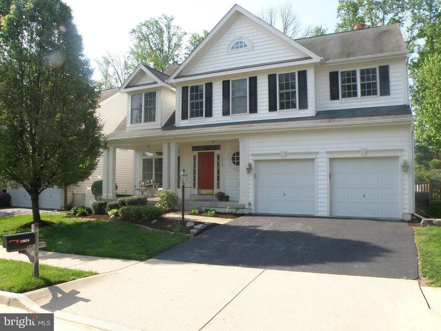 Showing Times Contact Owner.  MOVE-IN READY for stylish, modern family. Useable FRONT PORCH, 2 story foyer w/ hdwd, Large Formal LR & DR.OPEN CONCEPT  KIT/FR: 5 burner gas, Stainless Steel, 2 sets French doors to Huge deck.  Gas FP in FR.   2nd flr laundry,  Huge MBED w/ sit area, walk-in & gorgeous ensuite bath.  FULL FINISH BSMNT w/ wetbar, custom  bath and 5th NTC bdrm. Close to all.