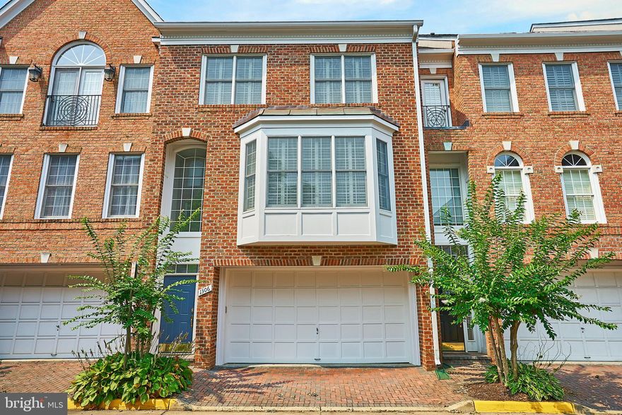 Luxury 5 level townhome. all connected with an ELEVATOR. Freshly painted. Each finished floor offers grand rooms including a huge main level room with custom built-ins surrounding the fireplace and a massive front bay alcove.  The elegant formal dining room adjoins the living room and overlooks the gallery foyer below. There is a chef's caliber kitchen with family area, 2nd fireplace upgrades including a huge island and surround speaker system.  There is a primary suite and a adjacent bedroom. The next level reveals another grand suite with private bathroom and two walk in closets. The mid level houses the casual leisure room offering a built in work station office area plus acess to the McLean Crest courtyard. There is a 2 car garage. On the lowest level there is a rec room and any other use to the imagination, plus a bonus room.