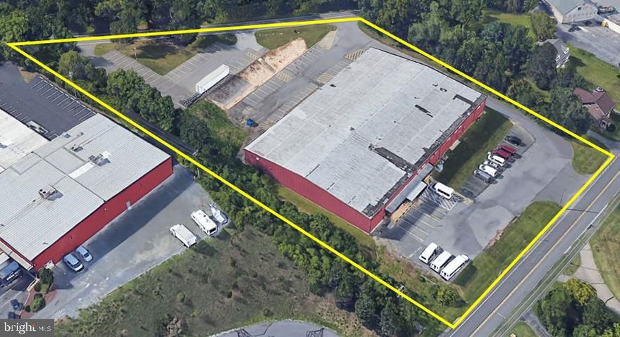 Mixed use building consisting of 14,400 sqft of office space and 25,950 sqft of warehouse with 3 roll up overhead doors and 4 loading docks.  76 space parking lot