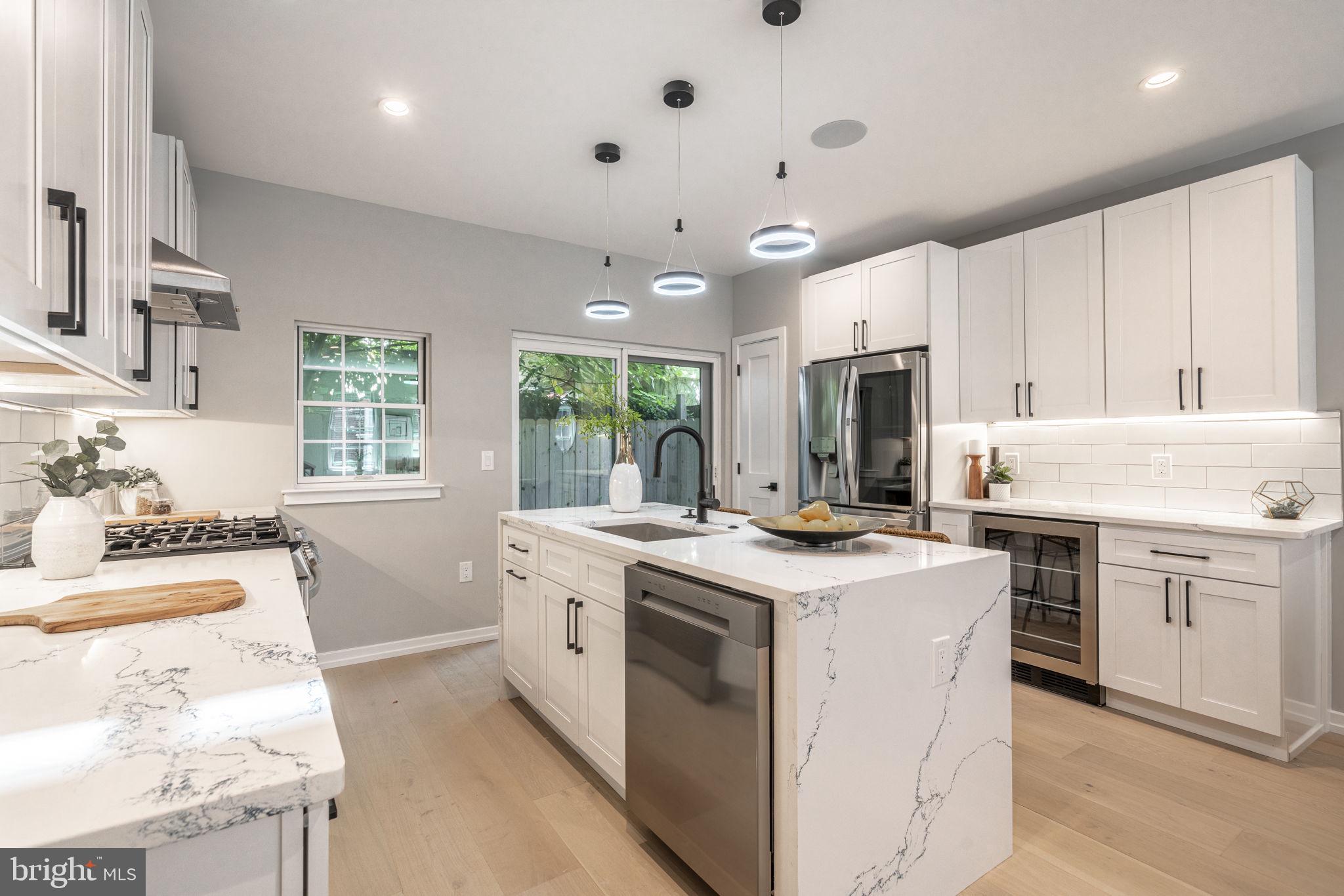 Welcome home to 2005 Kater Street! This new construction single family home is just what you've been waiting for. Featuring gorgeous hardwood floors, stainless steel appliances and quartz countertops, a patio, roof deck with amazing views of the city, hard-wired speakers in the ceiling and outdoor spaces, a fully finished basement, and a spacious master suite with built-in custom closets and a large master bathroom. Providing easy access to restaurants, shopping, schools, public transportation and much more, you'll have the best of Philly at your fingertips. Don't miss a great opportunity to live in this brand new home. Schedule your showing of 2005 Kater Street today! Fully approved 10 Year Tax Abatement and 1 Year Builders Warranty Included.