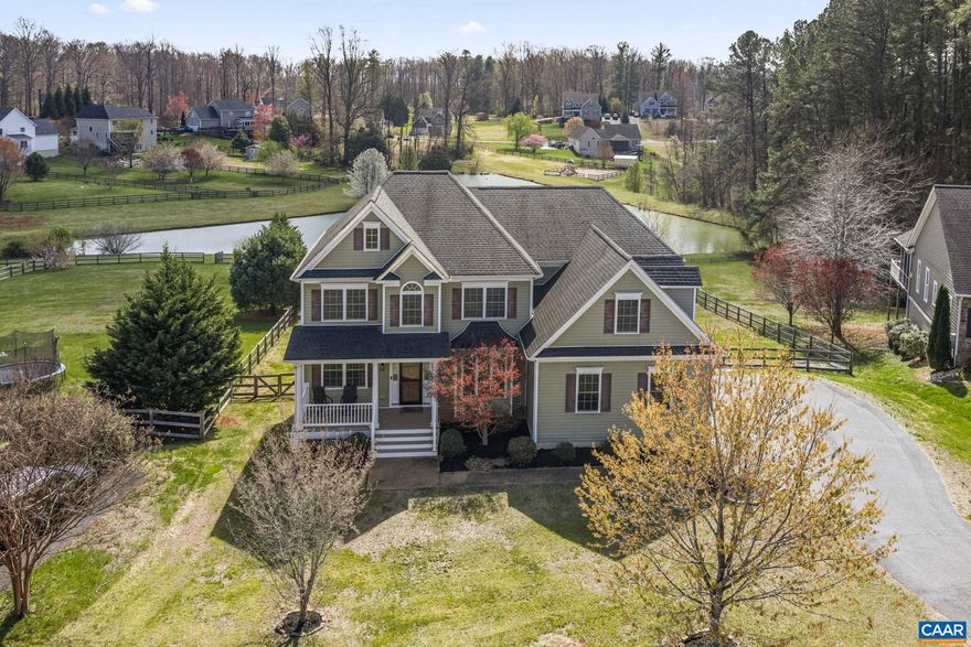 OPEN HOUSE Saturday, 04/04 12:00-2:00 PM! Welcome home to this grand 4-bedroom home with a bonus room/office, ideally located just north of Charlottesville in the highly desirable Wexford neighborhood in Greene County, on a quiet cul-de-sac. Enjoy your morning coffee on the covered front porch while taking in seasonal mountain views. Hardwood floors flow throughout the main level, leading into open living spaces with a dramatic two-story ceiling, a propane fireplace, and beautiful views of the pond from expansive back deck. The spacious, fully fenced backyard & large concrete patio offers the perfect setting for outdoor living and play. The kitchen features granite countertops, ample storage, and a functional layout ideal for everyday living and entertaining with a separate dining room. Upstairs, you?ll find a stunning primary suite along with three additional bedrooms and a full bath. The fully finished basement with another full bath provides a versatile space?perfect for entertaining, a media room, or a home gym. This home truly has it all?don?t miss your opportunity to see it!,Granite Counter,Wood Cabinets