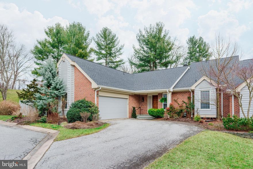 Inviting EOG home in the sought after "Meadows of Green Spring" Neighborhood has it all for easy living. This 2BR, 2 1/2 BA home has a  FIRST FLOOR PRIMARY BEDROOM  SUITE and attached 2 car garage. Spacious Kitchen with Breakfast room and separate Pantry/Laundry opens onto Screened-in Porch and wrap around deck, providing wonderful flow to  outside living.. Vaulted ceilings in Foyer, Dining room, Living room, and Den/Office. First floor half Bath too!  Main level Primary Bedroom with oversized closets and updated Bath provides a spa like feel PLUS a  heated towel rack. On 2nd level, there is an overlook to Living and Dining rooms. A 2nd level Bedroom with Bath and a hall closet which provides additional storage. (FURNACE 2019, ROOF 2019, FENCE 2020, HW HEATER 2023). Access to attached garage is off of kitchen. Well planned and established, these beautiful gardens provide a multitude of unusual shrubs and perennials WITH an underground sprinkler system-set it and forget it, for ultimate convenience. Screened in porch and wrap around deck along with brick patio and flagstone walk adds aesthetics.. ATTRACTIVE privacy fence with gate surrounds, back and side yards. Just outside the beltway, minutes to Green Spring Station, Falls Rd corridor, 83 , 695 and easy access to Hunt Valley and Downtown.  A GEM and MUST BE SEEN!