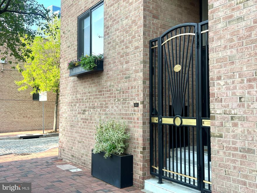 Welcome to 325 S 2nd Street... a Spacious Society Hill Modern Home at the corner of 2nd and Delancey Street.  Incredible light and views from all three sides of the house as it overlooks the charming tree lined cobblestone street of this historic district.  Enter the foyer which includes a convenient storage alcove with a bench seating and shelving which leads you to a spacious lower media room below and the open floor plan living/dining/and kitchen above.  Upstairs enjoy the East/West/ and North exposures through the large windows and graciously proportioned spaces for the dining/living/ and kitchen areas.  Foodies will love the well equipped chef's kitchen with custom shaker cabinets, a Wolf range top, Wolf double ovens, Sub Zero refrigerator, Bosch dishwasher, and granite countertops.  The second floor has three bedrooms and 2 full baths. The rear bedroom has the bathroom ensuite in addition to a convenient built in office nook for ease of working from home.  The third floor is the primary suite where you can unwind in the spa bath with a large walk in shower, a double vanity, and stylish glass subway tiling and finishings. Access the roof terrace to relax or entertain with the Delaware River, city views, and Ben Franklin Bridge as your backdrop.  The spacious media room includes a gas fireplace, custom bookcases, storage, a half bath, and the mechanical room.  Also, enter the rear brick private patio from the slider doors from there that has access to Delancey Street and the parking garage entrance.  As part of the Penns Landing Square association, owners enjoy 1 car garage assigned parking, access to the salt water seasonal pool, bicycle storage, secure deliveries in the package room, and their sidewalk maintained and shoveled in the winter months.  In the heart of Center City’s most intimate and charming neighborhood with enchanting green spaces such as Three Bears Park, the upcoming 12 acre Penns Landing Park capping 95, and Independence Park while also a mere stones throw away from nationally renowned restaurant Zahav and a local favorites Malbec and Pizzeria Stella, cafes, Ritz theaters. Also, convenient access to the entrance to 95 and 676 and only a 15 minute ride to the airport.