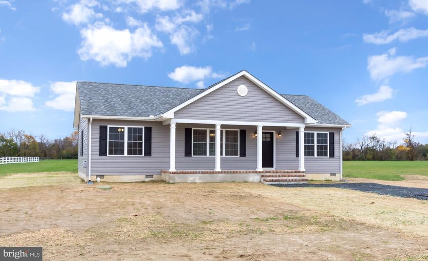 Brand New, open floor plan rancher on almost 1/2 acre, 3 bedrooms, 2 baths, spacious living room, kitchen with island & SS appliances, separate laundry room...hardwood floors, cathedral ceiling and upgraded lighting...(MHBR # 3423)