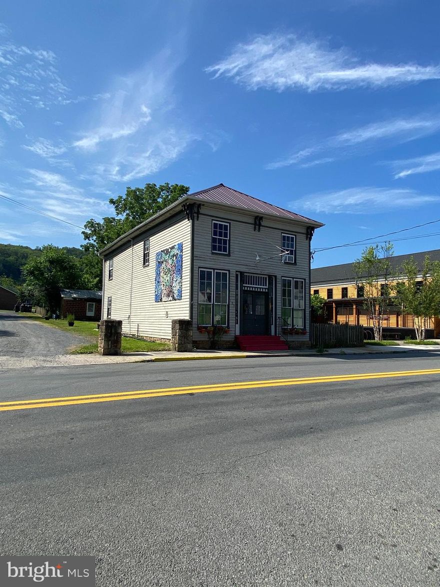 High visibility commercial space on Main Street in the heart of Wardensville.  The space features a storefront, separate office space, and bathroom. Located next to public parking.