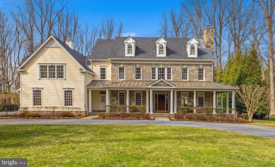 This remarkable estate on desirable street within walking distance to Potomac Village, Avenel Park & Heritage Farm Park was custom built for luxurious family living, grand scale entertaining and year-round staycationing. The heated saltwater pool with ocean blue PebbleTek finish and slate patio is replete with three shear descents, programable led lighting, retractable cover and diving board. The adjacent guest house with upstairs bedroom offers kitchenette, two full bathrooms, laundry, storage; and family room with fireplace and nana-wall opening to the poolside lanai. The gourmet kitchen with full suite of appliances, large island and eat-in table area connects to the great room with 11' ceilings and raised slate patio. Dining room comfortably seats 20 people or more when extending through to the living room. Main home includes five bedrooms up including the owners suite which spans the rear of the home and has sitting room, balcony, custom walk-in closets, changing room with sink, and steam shower. Expansive walkout lower level is an entertainers dream with kitchenette, family room with gas fireplace, gaming area, creative room, guest or AuiPair bedroom (no window or closet), exercise room, extensive storage, and finished space underneath the oversized three car garage that's perfect for theatre room or recreation room.  Professionally landscaped grounds boast mature plantings and extensive illumination. New in 2021: Waterfurnace Geothermal heat-pumps with hot water desuperheater, hot water storage tank and Aprilaire steam humidifiers. Room count and square footage include the guest house. Porches and Lanai total approx 1,000sf and are not reflected in square footages. See floorplans and site plan in photo stream.