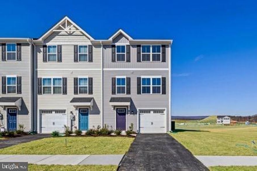 End-Unit Townhome at South Brook in Inwood.  Enjoy modern finishes in this beautiful 3 bedroom, 2.5 bath home including stainless steel appliances, LVP flooring, espresso cabinets, and granite kitchen countertops.  The spacious main level offers an open kitchen/dining and living room concept and features a convenient powder room for your guests.  The upstairs boasts a spacious primary bedroom suite w/ a large walk-in closet and includes a washer and dryer. The secondary bedrooms provide lots of space for the family, hobbies, or a home office! A full unfinished basement gives you the option to truly make this home your own.  Seller pays 3% towards closing costs with the preferred lender.  Schedule an appointment to tour this beautiful townhome today!  At South Brook,  enjoy a tot lot for children and a fenced dog park for your furry friend.  Take advantage of the wild beauty of WV and nearby VA...offering the peace and space you've been craving.  Just minutes to Rt. 11 and I-81.  Photos are representative only.