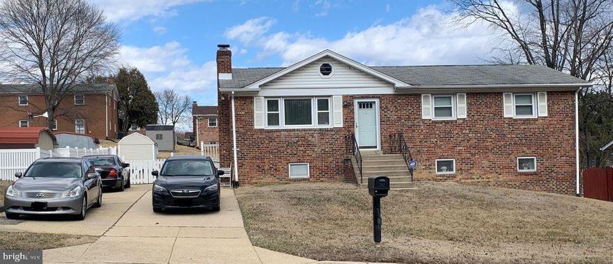 Brick rambler with large, finished basement. Master bedroom was bumped out to create a very large space with sitting room and direct exit to private deck. The back yard is huge and fenced in for privacy. Basement is super spacious and was just upgraded to luxury vinyl plank flooring. Kitchen and bathrooms are ready for your own personal renovation touches.