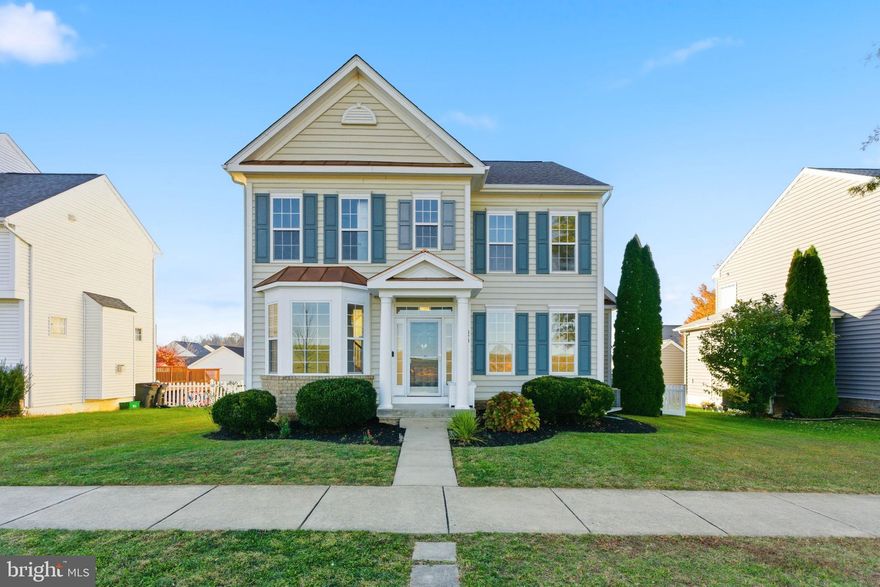 Nestled in the sought-after Huntfield community, this beautifully renovated Colonial-style home offers a perfect blend of modern comfort and timeless elegance. With over 4,000 square feet of finished living space, this residence features four spacious bedrooms and three-and-a-half baths, including a fully finished basement with a full bath and kitchenette.

The main level welcomes you with rich hardwood flooring and an open, flowing layout that connects the living, dining, and kitchen areas seamlessly. The chef’s kitchen is a true standout, featuring a large center island, stunning white cabinetry, and abundant counter space for meal prep and entertaining. The design perfectly balances beauty and function, ideal for both casual family meals and hosting guests. A cozy gas fireplace anchors the living room, creating a warm and inviting space to relax.

Upstairs, the primary suite provides a private retreat with an ensuite bath and walk-in closet. The additional bedrooms are bright and spacious, with stylish accent walls in the second and third bedrooms adding a touch of modern design.

The fully finished lower level expands your living options, featuring a full bath and kitchenette, perfect for guests, a media space, or multi-generational living.

Outside, enjoy the community’s tree-lined streets, sidewalks, and amenities including a pool (currently being built) and beautifully maintained common areas. The rear-entry detached two-car garage and convenient on-street parking add to the home’s charm and functionality.

This is more than just a home; it’s a thoughtfully updated, move-in ready property offering space, comfort, and a true sense of community in one of the area’s most desirable neighborhoods.