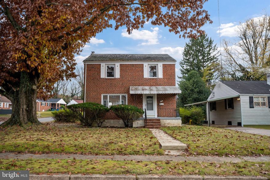 Newly remodeled 3BR/2.5BA brick single family home located on a sprawling corner lot in the quiet neighborhood of Grove Park!  Make your way to the covered front porch and open the door into your new home.  Step inside to a main floor filled with natural light and an open floor plan.  The main floor consists of a large living room, spacious dining room with a stunning light fixture, half bath, and gorgeous kitchen.  The kitchen features plenty of cabinets, sleek quartz countertops, stainless steel appliances, a deep sink under a window, and a peninsula with breakfast seating and a beautiful lighting fixture.  On the second floor are two sizable secondary bedrooms with large closets, a large primary bedroom with two closets, and a newly remodeled and beautifully tiled full bath.  On the lower level is additional living space offering a large family room with brand new carpet, a full bath, laundry, storage, and a walk-out to the amazing yard space.  From the kitchen step outside to a yard filled with green space and tons of possibilities.  This home is move-in ready with so much to offer new homeowners and is located in close proximity to shopping, restaurants, and commuter routes.