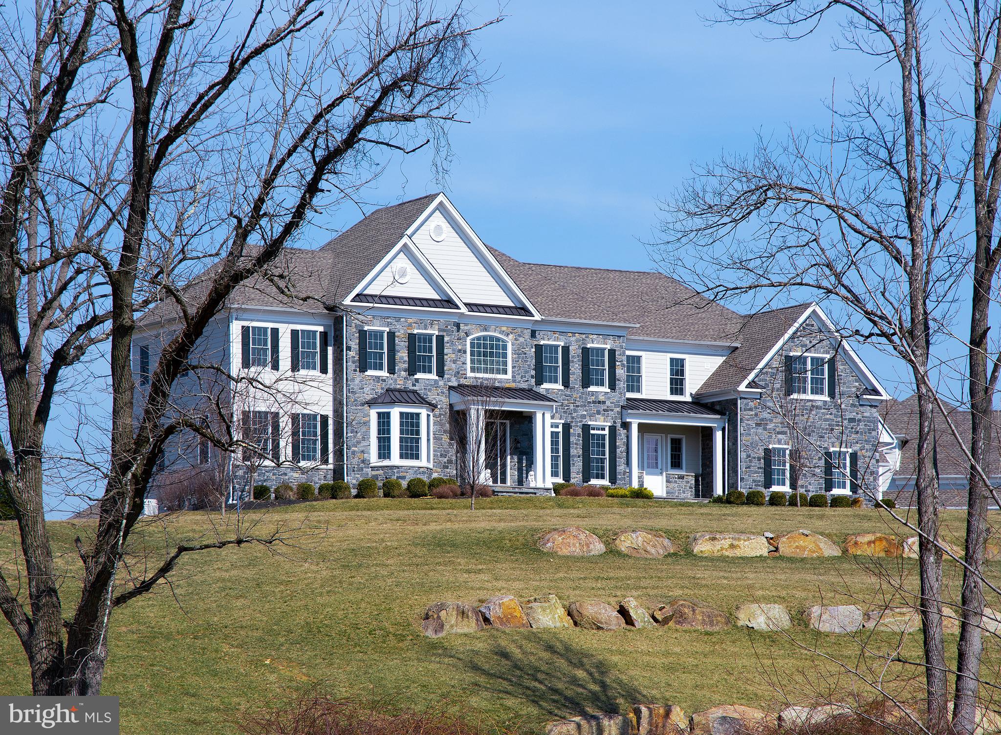 Come experience the ambience and carefree lifestyle of this elegant 5 bedroom, 5.2 bath Weatherstone model by Toll Brothers, built in 2016 to the highest standards. 3905 Dutton Farm Road in sought-after Newtown Square, PA is set on nearly an acre of flat pristine grounds in the Liseter community to-be gated Villanova section. Attractive community amenities including pool, clubhouse with fitness center, game room, and party/event room are complemented by friendly neighbors, great walk-ability, and a premium location near all local amenities. Interiors offer a perfect blend of comfort, serenity and balance, with an open floor plan that integrates the family in the heart of the home across the centralized kitchen, family and morning room; yet there is ample space for privacy, and peace and quiet for working remotely. This beauty boasts the largest floor plan of its kind, with all available extra rooms added AND the largest garage as well with a generous 5 bays and bonus room above, now used as a gym. The home is designed in a warm neutral, contemporary style and brimming with upgrades, from the appliances, cabinetry and countertops to hardwood and radiant heat flooring, high-end bathrooms, and custom closets. A gracious front-to-back entry hall with a turned staircase sets the tone. Entertain with ease in the formal living & dining rooms positioned on either side of the foyer. The gourmet kitchen is a favorite gathering spot with abundant cabinetry & quartz counters, commercial-grade Sub-Zero & Wolf appliances for the cook, custom backsplash, large island with seating for guests & family, plus convenient butlers & walk-in pantries. The kitchen opens to a light-bathed breakfast room with cathedral ceiling, and beyond is a extended family room with a soaring ceiling, fireplace & large sliding window doors. Adjoining is a multipurpose private retreat with French doors, currently used a playroom, but spacious enough as a game room with pool table, library or den. Also on the main level is a study, a large guest suite with full bath & sitting area, and 2 powder rooms. The second floor feature a luxurious primary bedroom with spacious and relaxing den, and huge his & hers walk-in closets. The spa-like primary bathroom is appointed with heated floors, dual vanities, soaking tub, and dual showers. Additional en-suite bedrooms, a bonus room, currently used as a home gym, but great as a media room or play room, and laundry room, complete the comfort. A full day-lit walkout lower level with high 9â ceilings, central air, sprinkler & security systems, UV protection window film, and a whole-house generator make this home irresistible. Monthly HOA covers use of all amenities as well as common area maintenance, trash & snow removal. Enjoy the ultimate location with miles of sidewalks & an easy connection to local trails. Liseter is centrally located within 10-15 minutes to the towns of Paoli, Malvern, Wayne, Radnor, Bryn Mawr, West Chester, and adjacent to Episcopal Academy.