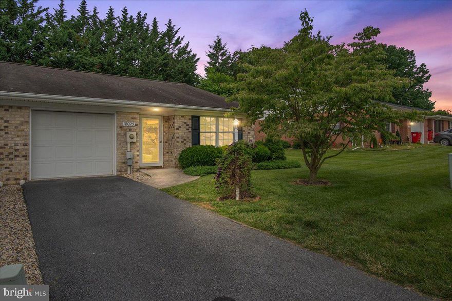 Welcome home.  This well-maintained END UNIT attached rancher style home features single level living with 2 bedrooms (1 primary suite), 2 full bathrooms, sunroom and attached oversized garage. The open floor plan, with tons of natural light, gives the space a light and airy feel.  The doors and hallways are extra wide to allow for easy accessibility.  

The sunroom and fenced in patio backs to trees and offers privacy and the chance to just sit and listen to the birds.  

New paint throughout.  The HOA fee is $180 a quarter which includes trash, mowing, snow removal, leaf removal...can living get any easier than that? Minutes to 1-70, I-81, restaurants, grocery and shopping. BEST of all, NO City taxes!