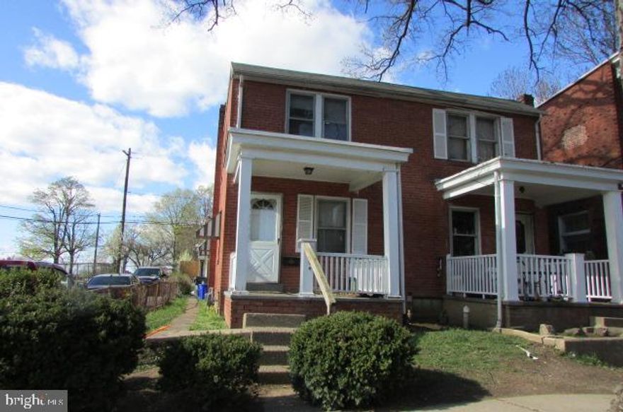 Brick Semi Detached home located in a convenient area. Close to all amenities, 3 bedroom, 1 bath. Gas heat and hot water. Corner lot. Detached garage in rear.