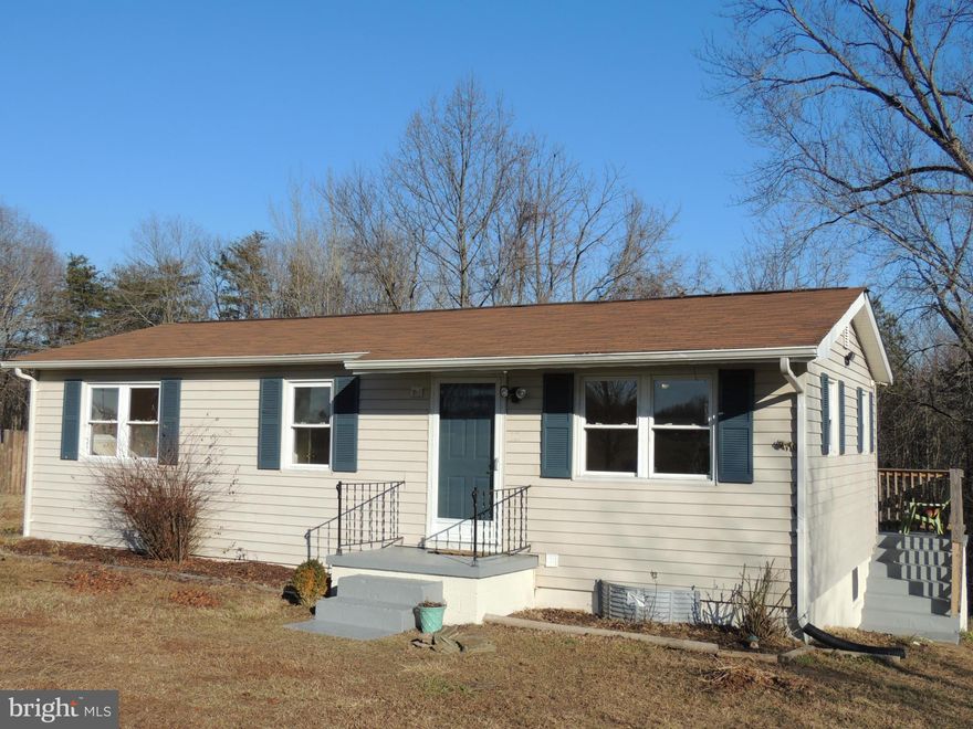 Beautiful country setting across from horse farms. Nice wood floors throughout, except for new vinyl in kitchen and bathroom. Newer heat pump, plumbing, hot water heater, pressure tank for deep well, new kitchen on one acre. Very nice small stick built house at an affordable price. Owner/agent. Great low maintenance, affordable home.