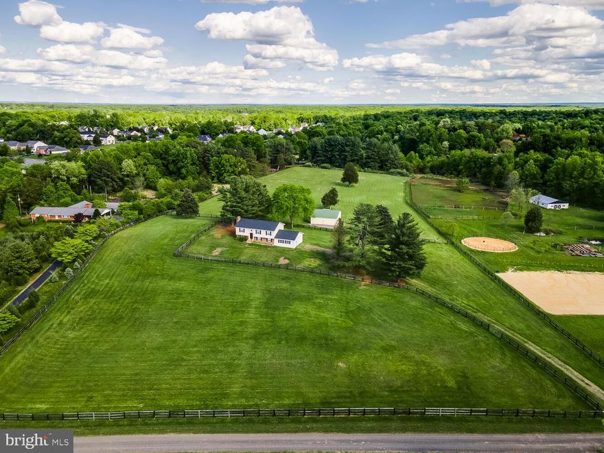 Gorgeous 7.6 acres of beautiful rolling hills and pastures. See documentation attached to this MLS  listing  of preliminary documentation by Fauquier County for future development  of this property as potentially 6 lots or build your massive estate, compound or retreat.  Alternatively, have you ever dreamed of owning an equestrian center or more simply a horse? Well, your dreams have come true upon purchasing this beautiful 7.6 acre parcel. Conveniently located just off  Rt 29 and I- 66.  A split rail fence encloses the entire property.  Existing home, built in 1979, is in good condition and features 3 bedrooms/ 2.5 baths, newer roof, furnace, CAC replaced in 2018, plus oversized 2 car garage, and partially finished walkout lower level with fireplace and two additional rooms ( note property perks for three bedrooms ). See attached documentation on recent septic/sewer system inspection and recertification, well inspection/well water recertification, platt, and subdivision research. This is a fantastic investment that is also rewarding and enjoyable to own. Greenville, Auburn and Kettle Run school pyramid! Don't miss the fantastic aerial photography included with property details and documentation. R1 zoning vs RA Zoning as well.  Well equipped  separate barn and outbuildings convey. OPEN HOUSE SUNDAY 1-4 pm