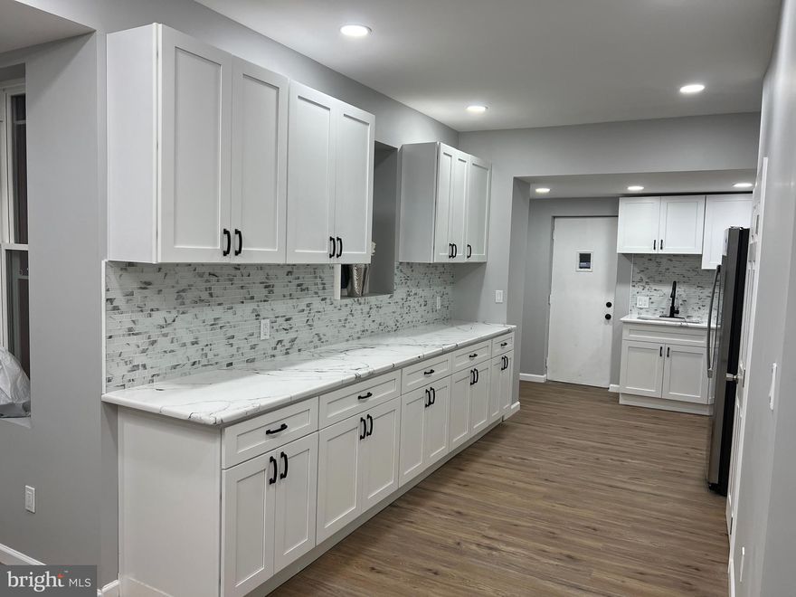 Schedule to see this completely remodeled brick face row home with 4 bedrooms and 2 and a half bathrooms. Upgraded throughout and fully finished basement. Sellers Assist available.