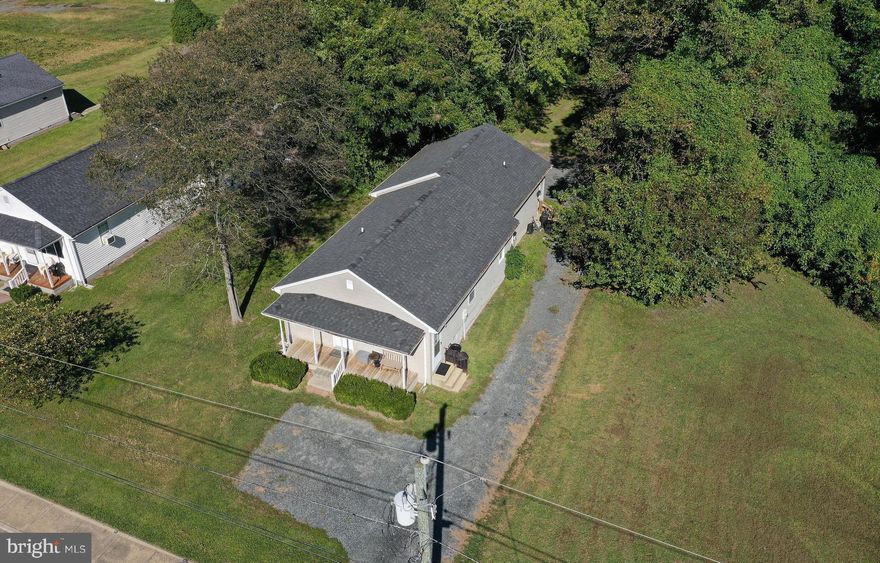 Investor Alert - fully-occupied duplex, a couple blocks from Historic Downtown Princess Anne, and less than a mile to University of Maryland Eastern Shore campus. Unit 1 is a 3BR/1BA unit with a welcoming front porch, nice-sized living room, eat-in  kitchen w/built-in microwave, stove, fridge.   3 bedrooms, full bath with laundry room - washer/dryer included. Unit 2 is a 2BR/1BA unit - cute living room, eat-in kitchen w/ stove, built-in microwave, fridge, and stacked washer/dryer included. 30708 Hampden rents for $825/month, lease ending 07/31/2026; 30710 Hampden rents for $800/mo, lease ending 05/31/2026. Water readers on lines separate each unit; tenants are billed monthly for water, and owner pays quarterly. Sizes, taxes approximate