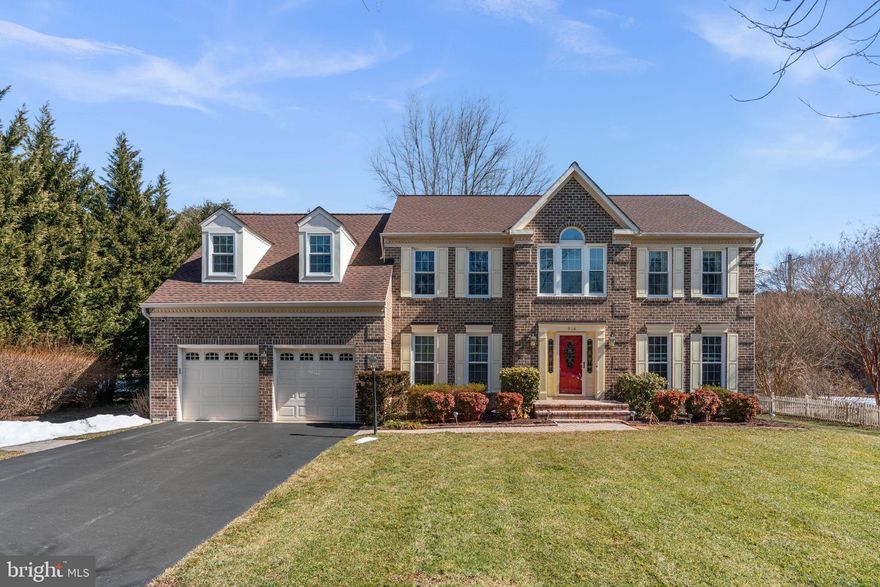Beautiful 4-bedroom home offering spacious living areas and thoughtful design throughout. The large eat-in kitchen features a peninsula, center island, and abundant cabinetry, along with a large bay window that fills the space with natural light.

Just off the kitchen, the adjacent family room is a stunning gathering space with a floor-to-ceiling brick fireplace surrounded by built-in bookshelves, a vaulted ceiling, and skylights that add warmth and brightness. From the family room, step into the sunroom encased in windows, which opens to a wonderful screened porch—perfect for relaxing or enjoying the outdoors.

The main level also includes a formal dining room with crown molding and chair rail, a formal living room with crown molding, and a private home office. A convenient half bath and a mudroom/laundry room located off the garage add everyday functionality. Beautiful hardwood floors run throughout the main level.

Upstairs you will find four bedrooms and a full hallway bathroom, including an owner’s suite with a spacious ensuite bathroom featuring a dual sink vanity, separate shower, and a large soaking tub.

Additional highlights include a two-car garage, a large yard with mature landscaping, and a storage shed, providing plenty of space both inside and out.  Mortgage savings may be available for buyers of this listing.