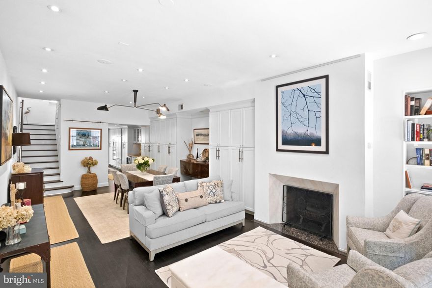 Located in the heart of Center City, this stunning Rittenhouse Square townhome embodies the perfect blend of classic elegance and contemporary comfort. 310 S. 16th St is an exquisite 3 bedroom, 2 full bath, 2 1/2 bath residence featuring OVER $100,000 in new renovations!  As you step inside, you'll immediately notice the care and dedication the owners have put into both updating and maintaining this lovely home. Upgrades include: new roofs, fully renovated primary bath, new boiler & hot water heater and renovated basement. This magnificent home is only steps away from Rittenhouse Square, the Kimmel Center for the Performing Arts, and many of Philadelphia’s finest dining establishments! The location is prime for both Center City & University City commuters, and it is located  within the highly desirable Greenfield School catchment (K-8)! On the first level, will find a beautifully-designed interior featuring high ceilings, gorgeous hardwood floors and an abundance of natural light. The living room features a lovely built-in bookcase and decorative fireplace (that can easily be converted to gas). The open-concept living/ dining area is ideal for entertaining guests.  You will be delighted to see the amount of built-in storage that runs the full length of the dining room and continues all the way into the kitchen. Nestled within this well designed custom cabinetry is both a built-in credenza and bar area with beverage fridge, mosaic backsplash, and gorgeous glass-paneled cabinets above. The custom cabinetry even allows for a discreet coat closet, a rarity in Philadelphia! On the way to the kitchen you will also find a 1/2 bath on this level. The modern kitchen with granite countertops, boasts top-of-the-line appliances, including a wine fridge, and wall oven, perfect for culinary enthusiasts! Enjoy making your favorite meals while admiring the gorgeous tile work and enjoying warm, radiant heated, kitchen floors! Step outside to discover a spectacular garden in the backyard, providing a serene escape. This beautiful outdoor space is perfect for relaxing, barbecuing with friends, or simply enjoying a morning coffee amidst lush greenery.  As you head upstairs take notice of the original balusters, ornate glass window, and hardwood stairs. Next, retreat to the luxurious primary suite, complete with a newly renovated spa-like ensuite bath( $35,000) featuring marble tiles, dual vanities with quartz countertops, decorative lighting and an enormous walk-in-shower! This main bedroom is full of sunlight and features another decorative fireplace, more built in bookcases and generous closet space. On the 3rd level, you'll find a spacious second bedroom that provides comfort and flexibility for family or guests. There is also plenty of space for this room to be used as both an office and guest bedroom combined. You will also find a well-appointed hall bath on this level. On the 4th level, you will fall in love with the most adorable sunlit bedroom with built-in bunk beds & a built-in desk, and charming dormer windows, making this a perfect child’s room. The finished basement ($10,000) with 1/2 bath has been renovated to provide a comfortable, additional living space. Enjoy this space as an entertainment area, home gym, or playroom. In the basement you will also find a spacious laundry room, ample storage and a restored (decorative) original stove. Have peace of mind to know that both the boiler ($12,000), hot water heater ($2,000) and roof ($25,000) were all just replaced in 2022. Enjoy the vibrant neighborhood with its charming streets, shops, and some of the best restaurants Philadelphia has to offer, including Enswell and Superfolie less than 1 block away! Whether you're dining at renowned eateries, enjoying a show, or taking a leisurely walk through Rittenhouse Square, this location of offers the ultimate urban lifestyle! Sellers offering 6 months pre-paid parking at a local lot at 15th and Spruce!