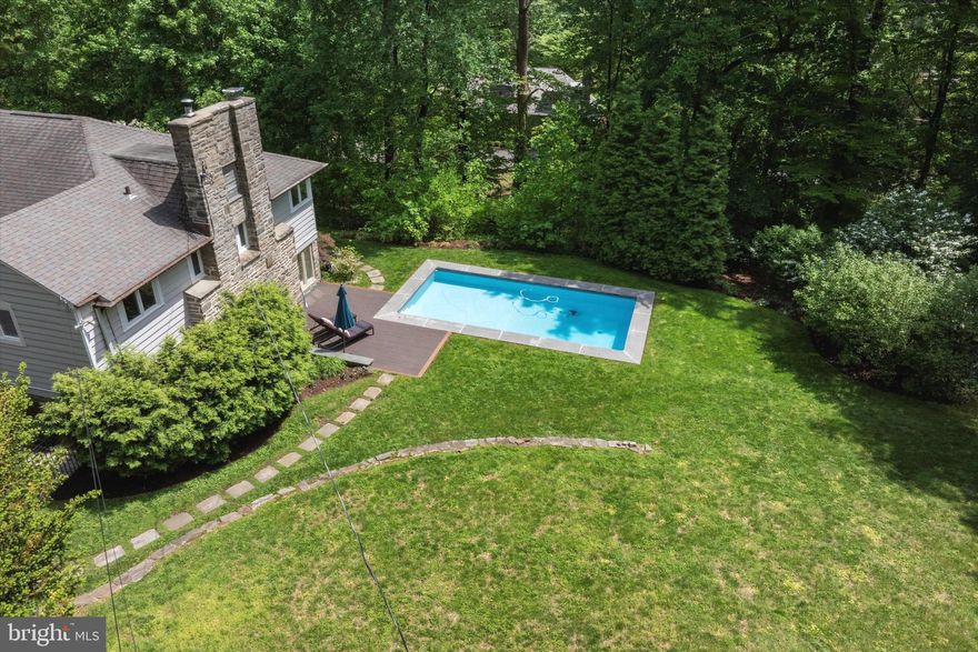 Hidden treasure! Distinctive property on Northside Haverford's most prestigious lane, utmost privacy, yet proximity to the train, shops & restaurants of Haverford & Ardmore's Suburban Squares, (a few minutes walking distance). 5,500 square feet of flexible open floor plan.  Adjacent to the Merion Cricket Club! Wall of windows in kitchen area and expansive Terrace add to year-round enjoyment of the grounds. Pool and deck installed in 2014. Many updates through the years, including replacement windows and a whole wall of windows and special lighting, and skylights were added. Charming Entrance Hall with graceful circular staircase. Spacious Living Room with multiple built-ins and custom Tennessee sandstone surround for the fireplace.  Porcelanosa Kitchen was installed in 2014, oversized peninsula, dishwasher, large FR with beamed soaring ceiling, two-sided wood fp and beautiful floors, laundry, utility and mud rooms, 2 PRs on that level. Backstairs to bedroom level, large master suite created out of two bedrooms, with an ensuite bath, entirely redone in 2014; second good size bedroom with bath, 3rd & 4th bedrooms share bath; A small flight of stairs in the back leads to another 2 guest rooms that share one bath. Opportunity for au-pair suite or in-law suite. Fantastic storage everywhere! Special location...special house!
