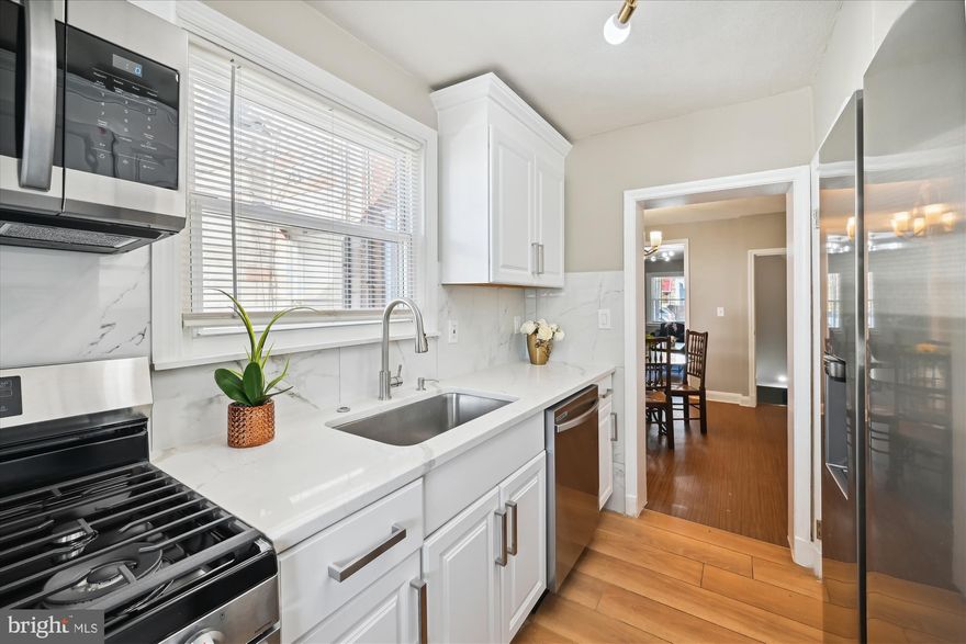 IGNORE DAYS ON MARKET......Buyer had a health emergency and could not continue with the purchase.......THIS IS YOUR CHANCE! AFFORDABLE Beautifully Renovated Home In Brooklyn, Just In Time For The Holidays! Come And Fall In Love! Three Spacious Bedrooms, Two Full Bathrooms, A Separate Dining Area That Can Accommodate A Full Size Dining Room (Perfect For Holiday Gatherings), Brand New Kitchen With Stainless Steel Appliances, Brand New Modern Bathrooms, A Fully Finished Basement, Large Fenced Backyard And New HVAC System! Included Is Also A Separate Lot In The Rear That Can Be Used As A Multi-Car Parking Pad Or Blank Canvas For Your Special Projects! If You Are Familiar With This Community, You'll Appreciate The Location And Convenience! If you Are Not Familiar, Come Check It Out! You Will Be Pleased! This Home May Qualify For Baltimore City Grants! Buyer Can Also Use MMP Program To Get Up To 5% Of Their Cost Covered!