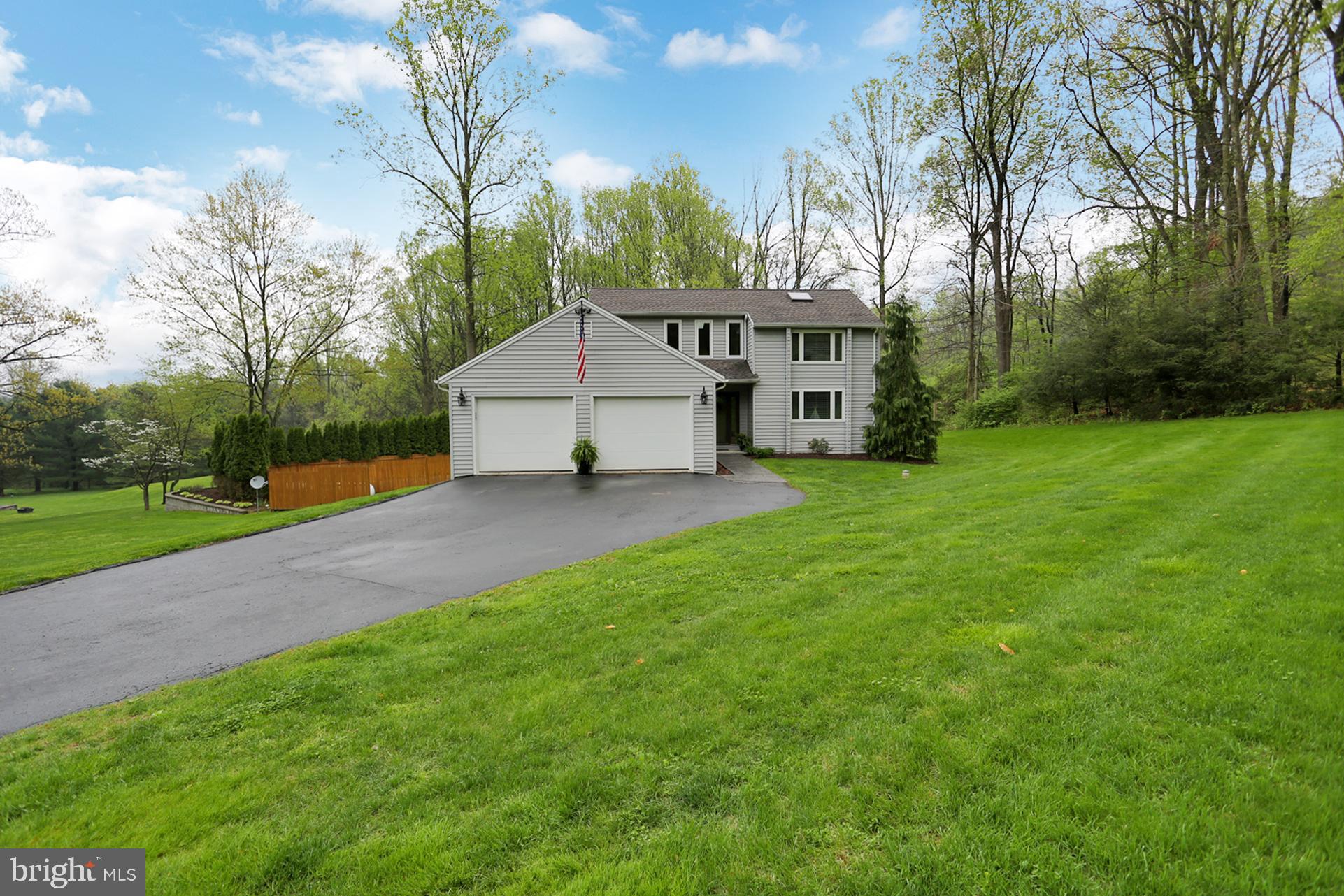 This is the one you have been waiting for!  This beautiful home nestled on 2.2 acres has been well maintained & has many beautiful features & upgrades. Before entering the home you will find gorgeous landscaping, an in ground salt water pool, stamped concrete, a pool house, and a brand new 12 x 24 shed.  Inside you will find 4 bedrooms and 3 full baths.  The main floor boasts a large living room with cathedral ceilings, sky lights, a propane fireplace, & beautiful laminate flooring.  The living room has french doors that open to a large composite deck overlooking the pool.  The main floor also has 2 bedrooms with over sized closets & a newly updated full bath.  The cherry kitchen provides lots of counter space and a butcher block island & opens to the dining area.  You will also find the laundry room on the main floor perfectly placed between the kitchen & garage.   The second floor provides a bonus room perfect for an office or sitting area, a large master bedroom with master bath & walk in closet.  The fully finished lower level (remodeled in 2014) adds another living room as well as a full bath and bedroom.  Additional features of this home include a radon remediation system, solid wood interior doors, skylights, over sized 2 car garage with workbench,  tons of storage, and so much more!  Don't hesitate! Set up your showing today!