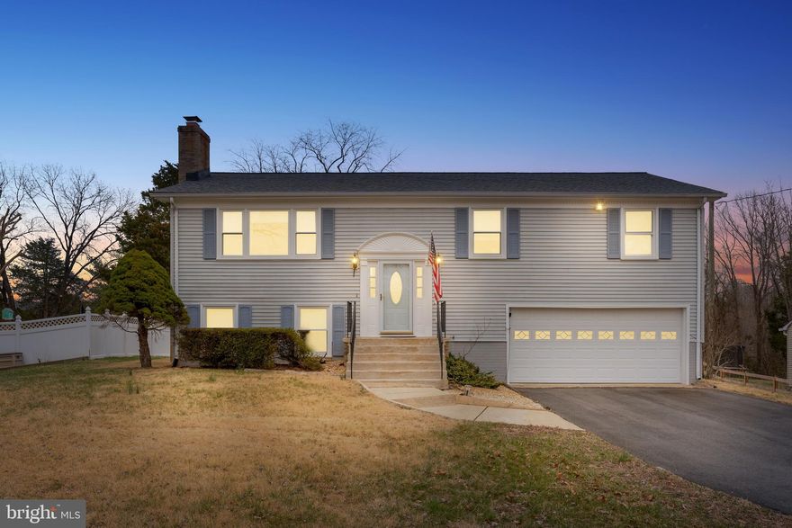 Professional pictures done!
Step into this welcoming home and instantly be greeted by a beautiful slate foyer—just the beginning of the charm you’ll find throughout. Possibly occupying one of the best lots in the community, the property features light gray siding, blue shutters, and inviting front steps that add to its curb appeal. The yard is expansive yet mostly level, dotted with a few mature trees.

Inside, the bright and airy kitchen boasts stainless steel appliances (installed in 2024), plenty of storage—including a pantry—and a sunny breakfast area overlooking the backyard. The adjoining dining room leads out to a large, sturdy deck, perfect for outdoor entertaining or peaceful relaxation. On this main level, you’ll find three inviting bedrooms including a full hall bath, and the primary bedroom includes its own private ensuite.

Descend to the lower level, where a wood-burning stove/fireplace has provided cozy warmth over the years. This level also includes a third full bath, multiple large closets, a dedicated laundry room, and interior access to the garage. Outside, a handy storage shed meets all your outdoor organization needs.

Major updates over the past few years include a new roof, heat pump and windows throughout  in 2019,  driveway repaved 2020, and hot water heater in 2023.  Additional upgrades include a new garage door and new sliding glass doors in 2011.  With cosmetic upgrades, you’ll discover a true gem that’s ready for your personal touch. Plus, the home is ideally situated near I-95, and Aquia Harbour offers a host of amenities to enjoy. Don’t miss this wonderful opportunity!