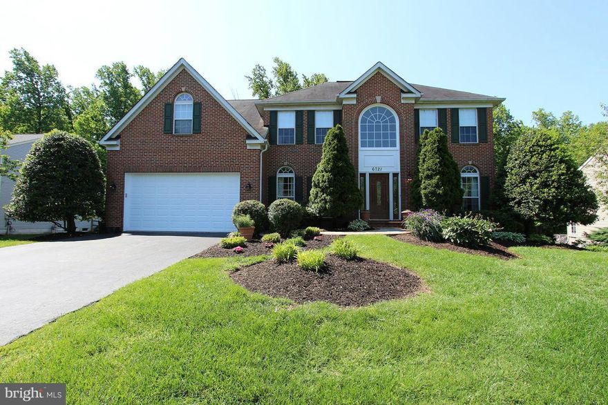 Gorgeous SFH, 2 car garage, backs to trees, landscaped, hardwood floors first level, granite counters, stainless steel appliances, columns and crown molding. Fully finished rec room/basement with side entrance. Family oriented neighborhood and close proximity to major highways and metro rail.