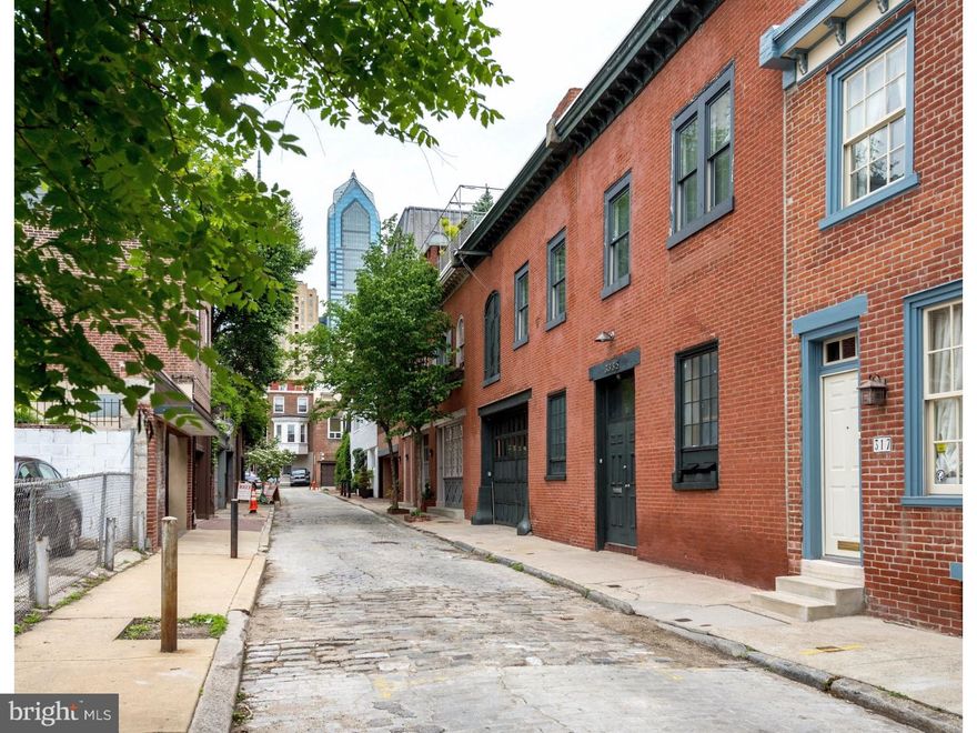 PREMIUM HORIZONTAL LIVING--Rarely offered historic, double-wide carriage house with four-car Garage on a charming Rittenhouse block.  With original character, this 48' wide home offers the potential to create an extraordinary Rittenhouse residence.  3,790 sq ft of space on two floors, which includes the 770 sq.ft. 4-car garage.  Possibly add a 3rd floor and roof deck with spectacular skyline views.  An open palette to create your dream home.  Amazing ceiling heights, exposed original brick and beams, hardwood floors, historic windows.  Roof access with amazing Center City views.  Renovate the current structure and/or add a large third floor addition and deck.  With very limited interior structural walls the possibilities with this carriage house are endless.  And of course an A+ Rittenhouse location.  Note--On the second floor is currently set up as a 3 bedroom apartment with a large unfinished storage area.  Keep the 4 car garage or create a 2-car garage and add more living space.  Bring your architect.