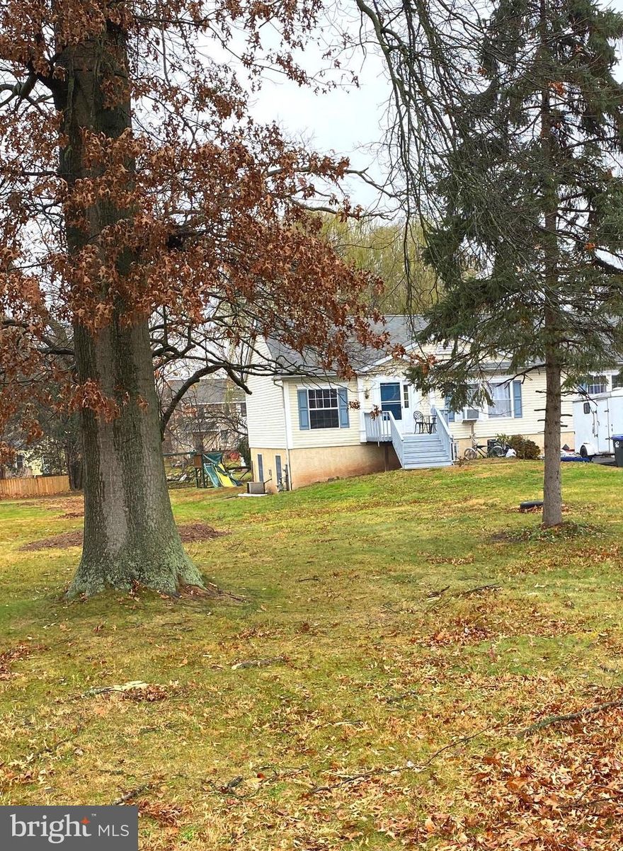 Great opportunity to purchase a single ranch style home in the Trappe/Collegeville area on a cul-de-sac location.  Situated in close proximity to all your daily needs including, but not limited to, an array of shopping centers, casual and fine dining, major traffic routes and the Ursinus college.  As you enter the home, you will find a spacious living room with coat closet and open views of the dining and kitchen areas.  Three spacious bedrooms and two full baths featuring tub/shower combo can also be found on the main level.  The country style kitchen features oak cabinetry, stove, microwave, refrigerator and dual stainless sink that overlooks the expansive rear deck and rear yard.   Additional cabinetry and side peninsula will aid in entertaining. Adjacent the kitchen you will find main level laundry and side entry to the home.  The dining area features chair rail, shadow box and crown moldings, decorative columns, and sliding glass doors that lead to the expansive rear deck that overlooks the level rear yard.  Natural light abounds throughout the main level.  The partially finished lower level features one additional bedroom with two large windows, a spacious family room, tile flooring and walk up stairs with French doors that lead to the rear yard.  There is an additional unfinished area on the lower level that could easily function as a workshop, gym, and/or storage area to name a few. This home is a good canvas for you to bring your creativity, design and finishing touches to life as you make it your own.  Envision the possibility of creating a greater open concept layout of the living room, kitchen and dining areas or adding a large kitchen island with upgraded appliances and so much more.  Additional features include:  Newer heater, water heater and roof (2001).  Sq. ft. is approximate.  Shown by appointment only.