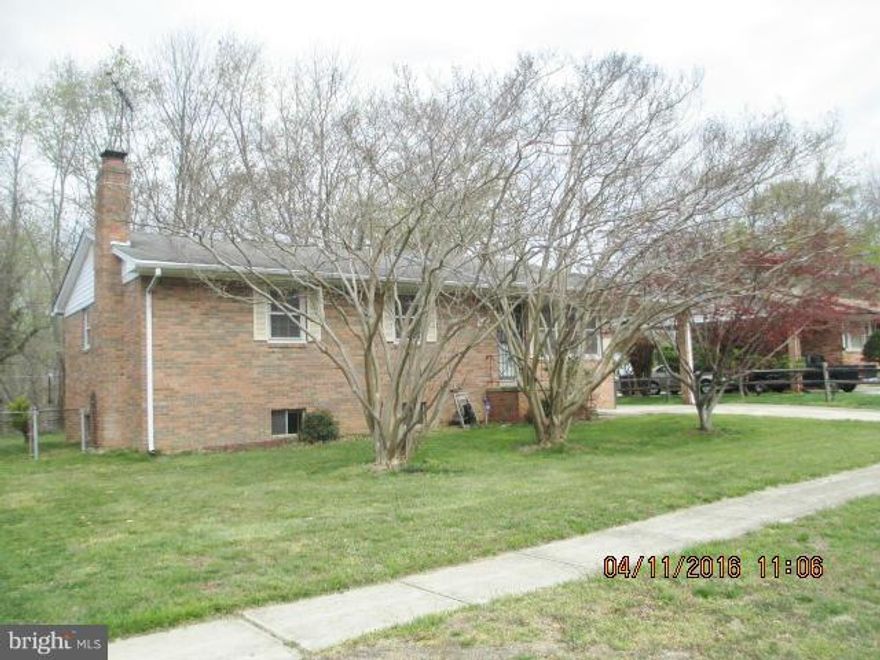 Solid home in pleasant neighborhood - hardwood floors, level lot, unfinished lower level, carport, driveway.  Extremely convenient location. Seller is exempt from transfer/recordation taxes so buyer pays all. Sold as-is.