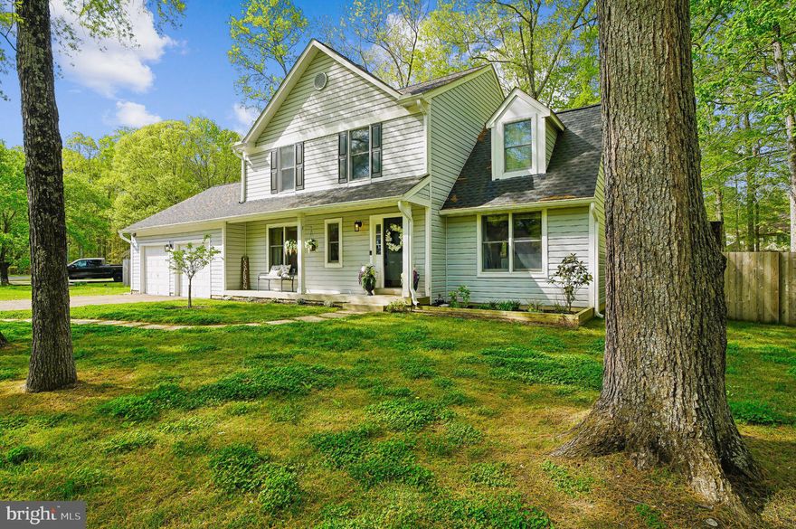 Charming Colonial in the sought-after community of Cedarlea! This 3-bedroom, 2.5-bath home welcomes you with an inviting foyer complete with a convenient half bath. The main level features a spacious living room, separate dining room, and an additional entertainment area, all thoughtfully connected for everyday living and easy entertaining. The centrally located kitchen offers seamless access to all main living spaces. Both the kitchen and dining room provide direct access to the deck, perfect for hosting, overlooking a large, privately fenced backyard.

Upstairs, you’ll find three well-sized bedrooms and two full bathrooms, including a primary suite with a walk-in closet and a private bath featuring a spa-like shower with a built-in tub.

Recent updates include a new roof and gutters (2024), kitchen appliances (2025), washer and dryer (2025), and a cedar privacy fence (2025). 

Enjoy being just steps from Cedarlea’s community amenities, including a boat ramp, pier, and playground, with access to the West River for boating, kayaking, and fishing. Conveniently located near shopping, dining, and offering an easy commute to Annapolis, DC, and Baltimore. Don’t miss your opportunity!