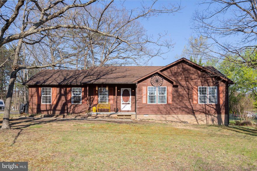 Tucked inside the gated community of Lake Holiday, this beautiful cedar home offers the perfect blend of warmth, simplicity, and easy one-level living.

From the moment you walk in, you’ll feel the cozy charm; hardwood floors, natural wood tones, and a welcoming layout that makes you want to slow down and stay awhile. A brand new wood stove adds both comfort and character, creating the perfect spot to gather on cooler evenings. Thoughtful updates like a new hot water heater and recently refreshed exterior stain give peace of mind while maintaining the home’s rustic appeal.

Step outside to a spacious yard with plenty of room to relax, entertain, or simply enjoy the quiet surroundings.

And then there’s the lifestyle… Lake Holiday offers so much more than just a home. Enjoy access to a large private lake, sandy beach, walking trails, and the ability to fish or take your boat out for the day—all within a secure, gated community.

If you’ve been looking for a place that feels like a retreat but still keeps you connected, this one is truly special.