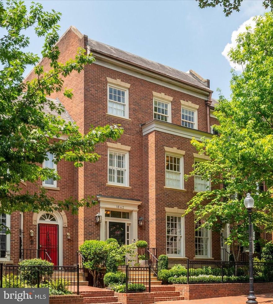 Stunning Georgetown home with approx 4,300 sq. ft.  featuring 5 bedrooms, 5.5 baths, an elevator to all floors, a private rear patio,  and a two car garage! This home has been beautifully renovated with high-end finishes, thoughtful details and a fabulous floor plan. The main level showcases a chef's kitchen, dining room, and large living room with wood burning fireplace. The upper level has a luxurious primary suite with attached office, multiple closets and two primary baths. The upper level has three additional bedrooms and two newly renovated bathrooms. The lower level has an incredible built-in play area, tons of storage, a newly renovated full bathroom with sauna, and a 5th bedroom / gym.