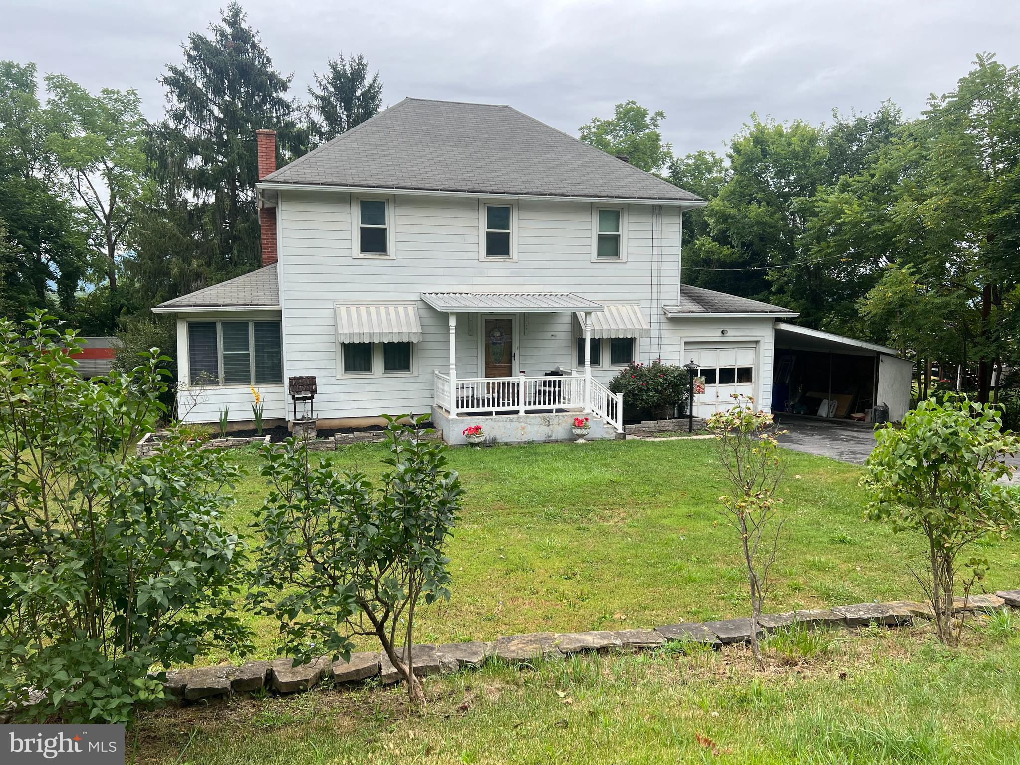 Charming 2 story home located on a large lot in town. A backyard that offers plenty of room for your family outings and fun time. This home has numerous updates including but not limited to; eat in kitchen, sunroom, laundry area, nice porch in rear of the house, mini splits in basement and first floor with electric baseboard heat. There is a unique pantry off the kitchen, hardwood floor and carpet throughout home. Must See to appreciate!